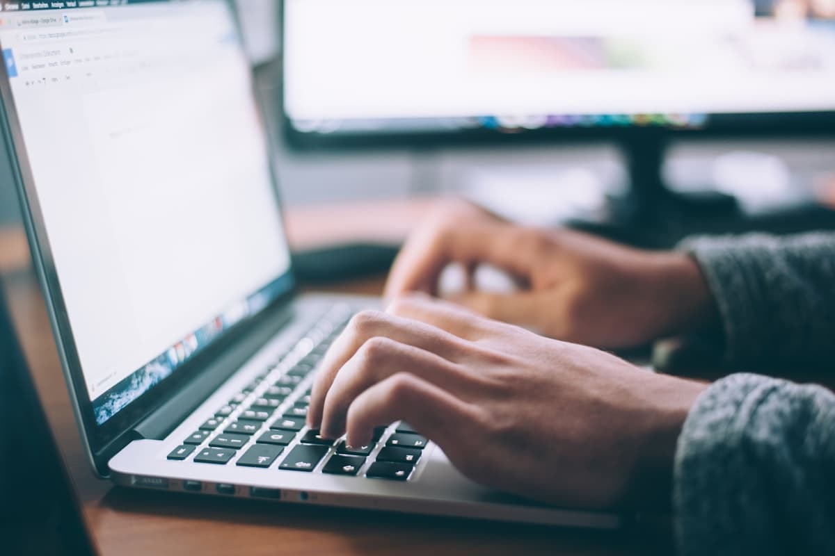 Person reviewing tax registration details on a laptop
